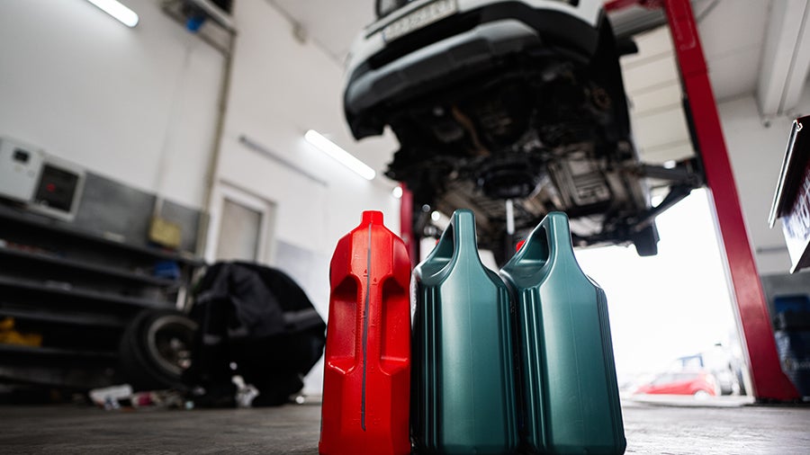 Car Repair Shop with Oil Container